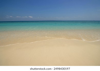 Gili Labak Beach features pristine white sand and turquoise waters.  - Powered by Shutterstock