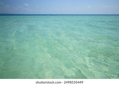 Gili Labak Beach features pristine white sand and turquoise waters.  - Powered by Shutterstock