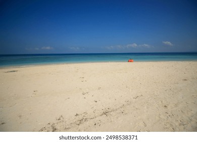 Gili Labak Beach features pristine white sand and turquoise waters. - Powered by Shutterstock