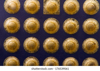 Gilt legs of the computer's processor. Abstract background. Macro