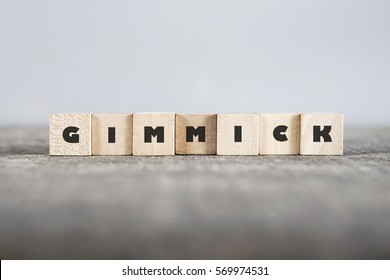 GIMMICK word made with building blocks - Shutterstock ID 569974531