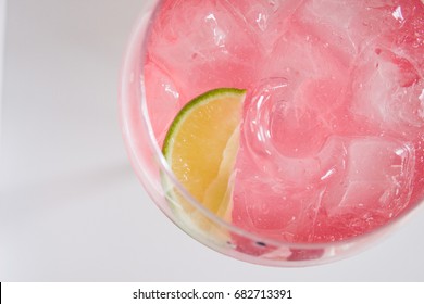 Gin And Pink Tonic With Lime