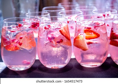 Gin And Pink Tonic With Strawberries And Ice