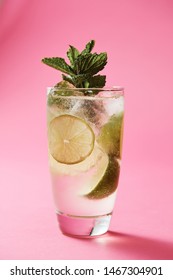 Gin Rickey Highball Cocktail On Pink Background