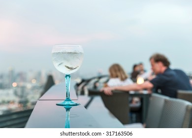 Gin Tonic Cocktail On Table In Rooftop Bar