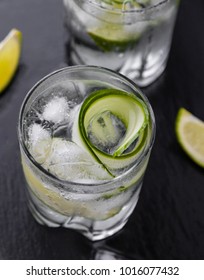 Gin Tonic With Cucumber, Lime And Ice In Glass