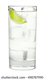 Gin And Tonic Or Soda With Lime Wedge And Ice In Highball Glass  Isolated On White Background