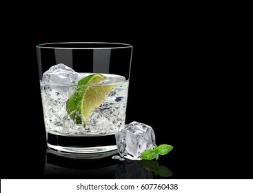 Gin Tonic Or Vodka Lime And Basil Isolated On Black Background