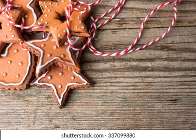 Ginger Bread Cookies Spread On A Shabby Wooden Background