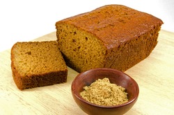 Ginger Cake On Wooden Board With Ginger Powder