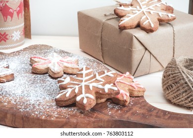 Ginger cookies and gifts in craft paper scandinavian style to make celebration sweeter
