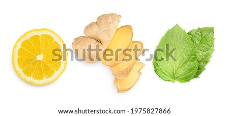 ginger root, lemon and mint leaves on white isolated background. top view