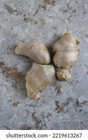 Ginger Root Lies On A Stone Marble Cutting Board In The Kitchen. For Banners Leaflets Labels Signage Recipes