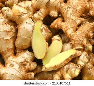 Ginger root and ginger slice. Fresh ginger root and ground ginger spice. - Shutterstock ID 2105107511
