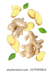 Ginger Spice With Cut Slices And Mint Leaf Flying In The Air Isolated On White Background.