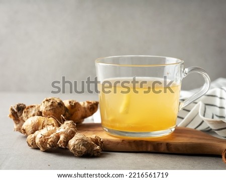 Ginger, warm ginger tea in a cup