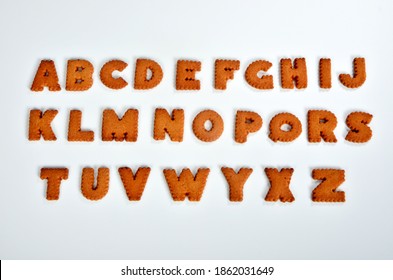 Gingerbread Christmas Alphabet On White Background. Gingerbread Alphabet Letters