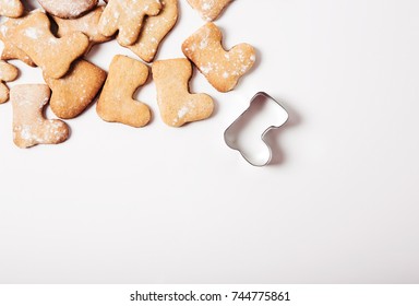 Gingerbread And Cookie Cutters Background.Christmas Shoe.Top View.Flat Lay.