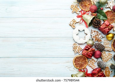 Gingerbread Cookies With Chrismas Decorations On Wooden Table