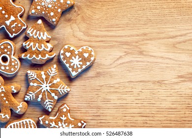 Gingerbread cookies on wooden table. Close up, top view. Merry Christmas and Happy New Year!! - Powered by Shutterstock