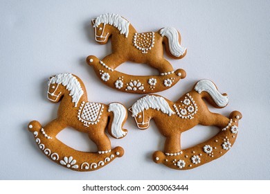 Gingerbread cookies with powdered sugar in the form of a horse