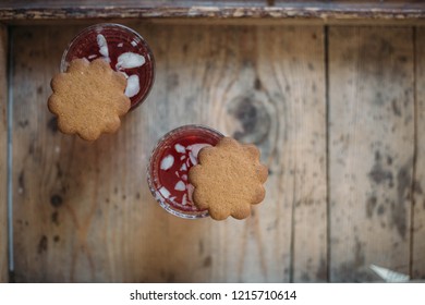 Gingerbread And Glogg, Also Known As Scandinavian Mulled Win Is A Traditional Scandinavian Warming Drink. Christmas Background And Concept For Design