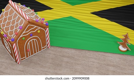 Gingerbread house with the flag of Jamaica on the table