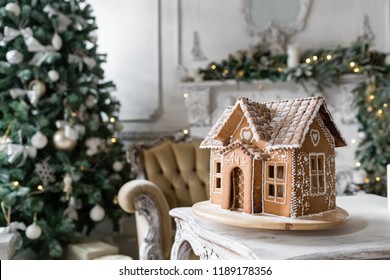 gingerbread house in living room. Christmas morning. Wonderful holiday mood