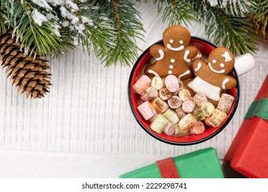 Gingerbread man cookies in a cup with marshmallow. Christmas holiday with copy space - Powered by Shutterstock