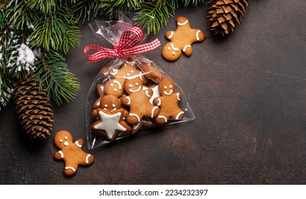 Gingerbread man cookies in gift package. Christmas holiday card with copy space