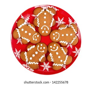 Gingerbread Man Cookies On Red Christmas Plate, Isolated Over White