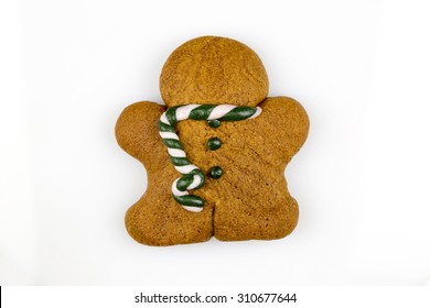 Gingerbread Man With No Eyes In Front Of White Background