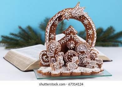 Gingerbread Nativity Scene And The Open Bible In Background