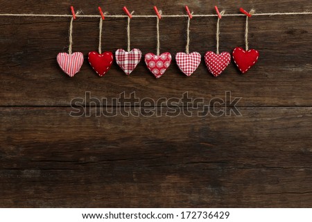Gingham Love Valentine's hearts natural cord and red clips hanging on rustic driftwood texture background, copy space Stock fotó © 