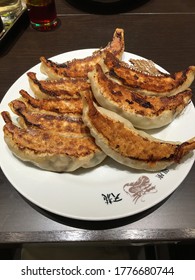 Ginza, Tokyo / Japan - September 2019: Plate Of Fried Gyoza, At Tenryu - Plate Caption Reads 