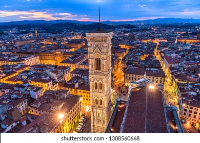 Giotto's Campanile - An aerial dusk view of Giotto's Campanile and the historical Old Town of Florence, as seen from the top of Brunelleschi's Dome of the Florence Cathedral. Florence, Tuscany, Italy. - Powered by Shutterstock