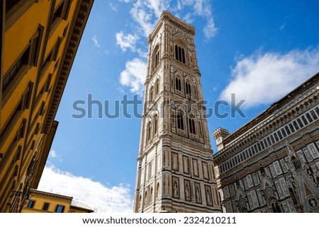 Giotto's Campanile, this majestic free-standing bell tower is part of the complex of the Cathedral of Santa Maria Del Fiore and is the undisputed masterpiece of Italian Gothic. Florence, Italy.