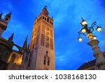 Giralda tower illuminated at sunset, Cathedral of Seville, Andalusia, Spain