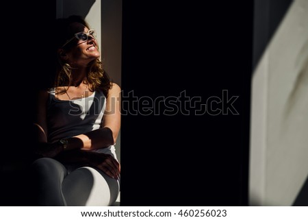 Similar – Young surfer woman with top and bikini kissing surfboard