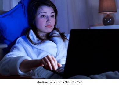 Girl Addicted To Computer Surfing On The Internet