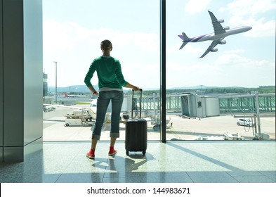 Girl At The Airport Window