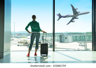 Girl At The Airport Window