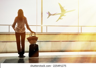 Girl At The Airport Window