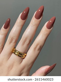 Girl Applying Brown Nail polish 