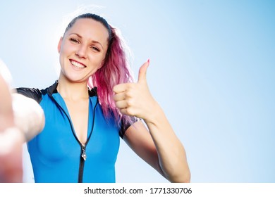 Girl Athlete Fitness Sport Blue Caucasian Clothing Is Talking On Phone Selfie Front Camera Hands Holding The Stream