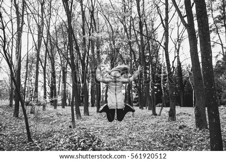 Similar – Image, Stock Photo Woman opening arms while enjoys nature in a tree forest.