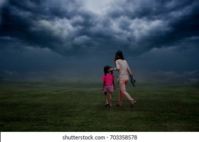 The Girl And The Baby Are Running Away From A Storm Of Rain, Coming In Horrible Pastures.