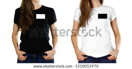 Girl with a badge on her chest. Close up. Isolated background.