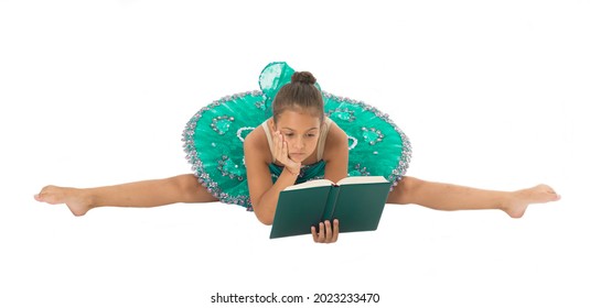 Girl Ballerina Stretching Split While Read Book. Ballet Career Issues. Depriving Children Ballerina. Most Of Time Child Dancer Spend Gym Training Practicing Stretching. No Time For School Studying