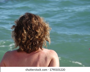 curly nudist out of sea